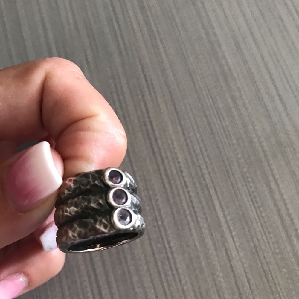 Sterling silver ring w/ purple stones